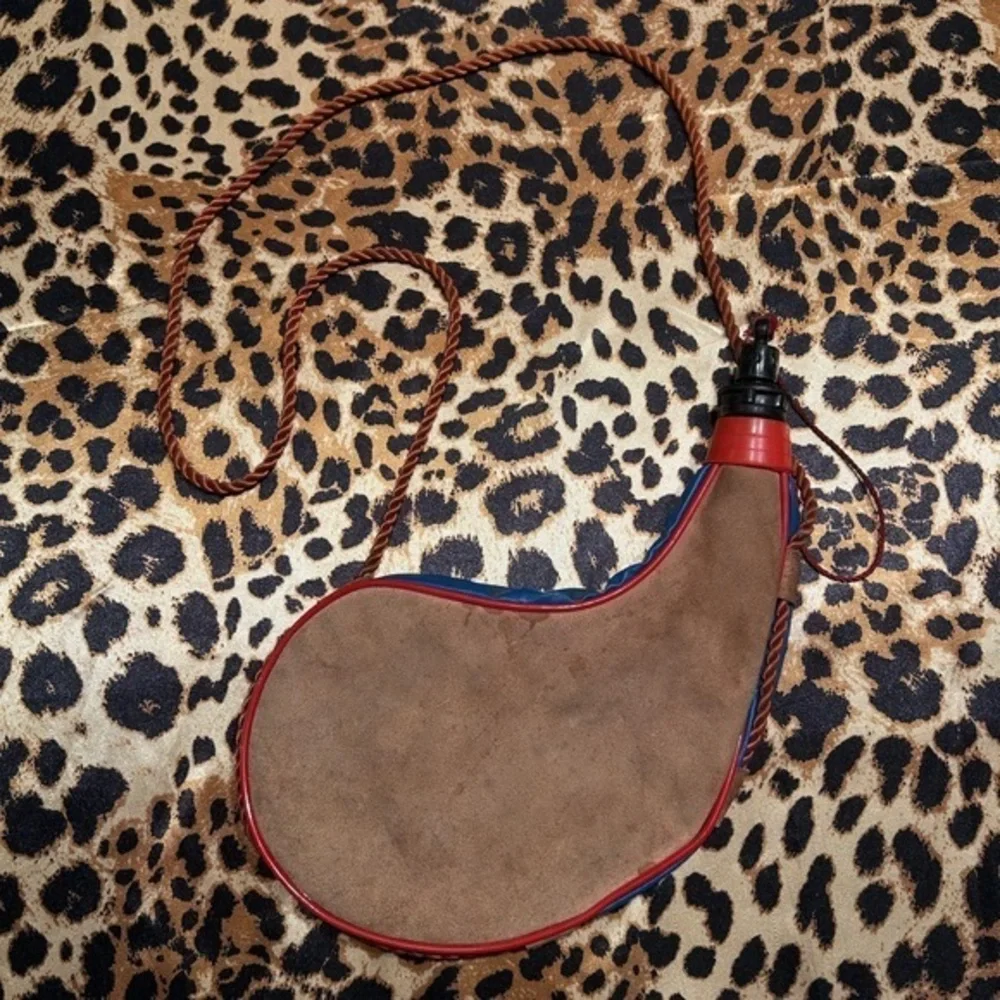 Brown and Red Leather Flask with Rope Strap